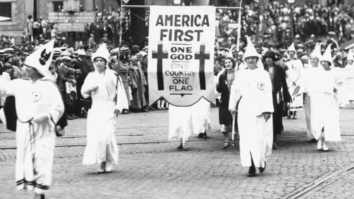 Klan members march in an Indiana parade.