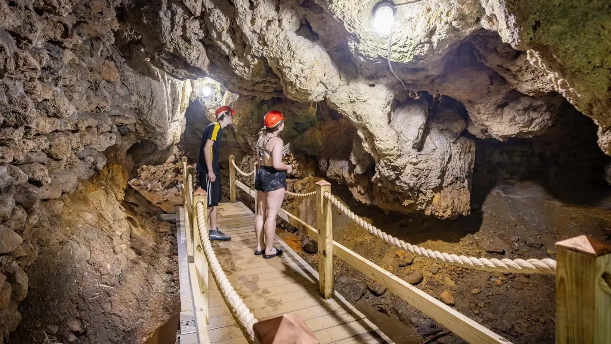 Visitors tour Bear Cave in Buchanan, Michigan