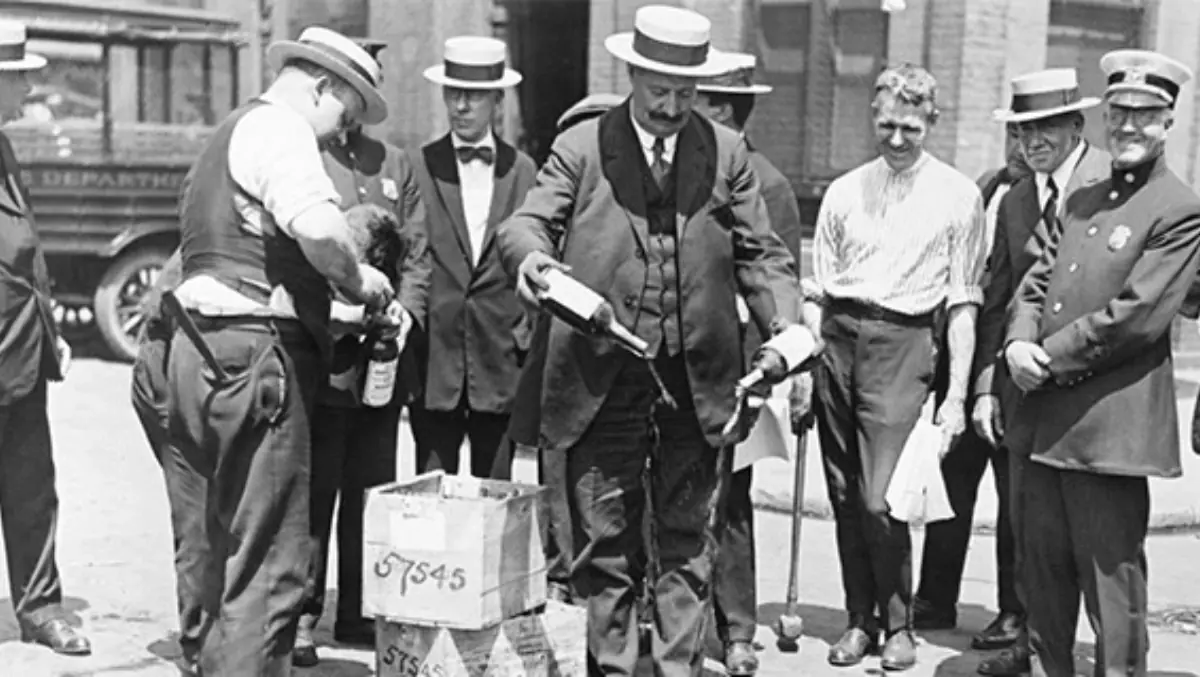 Early photograph shows Prohibition enforcement disposing of alcohol